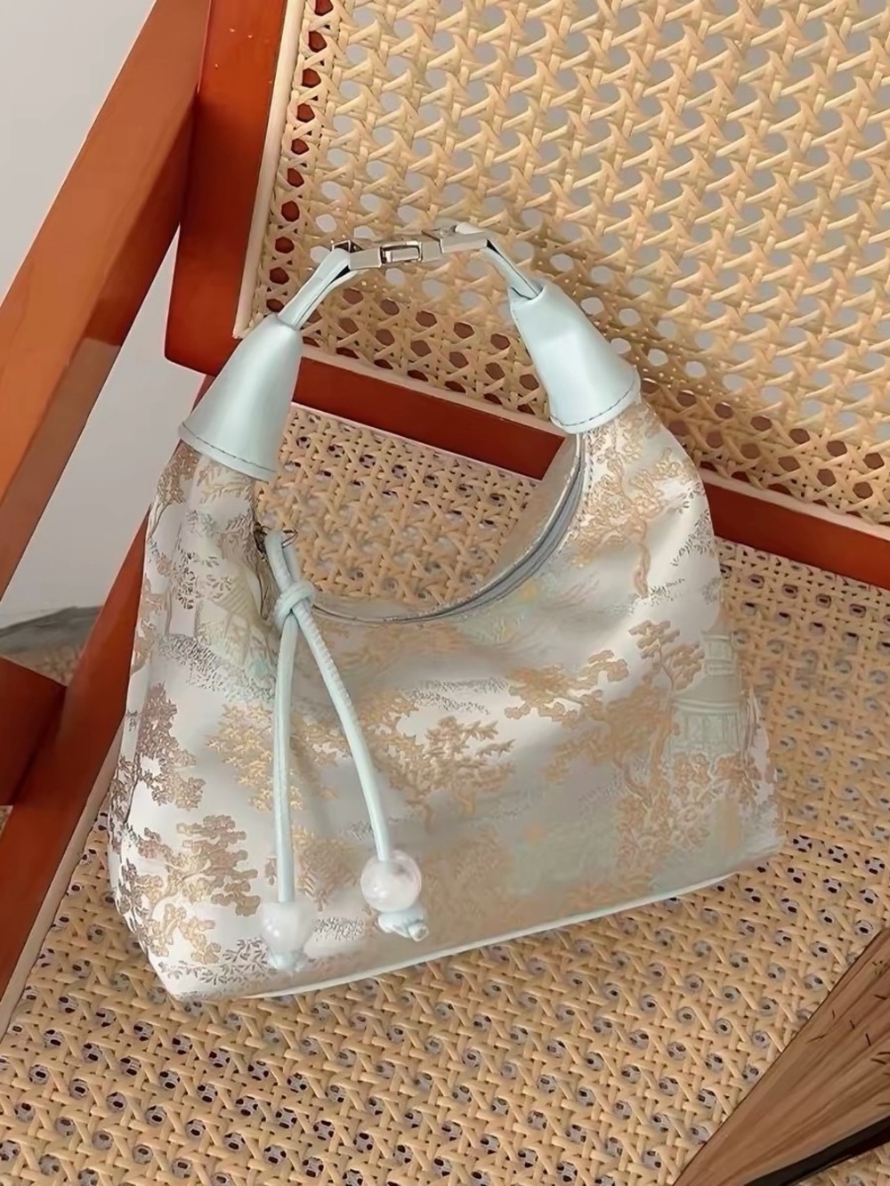 Pale Blue Jacquard Shoulder Bag with Gold Motif